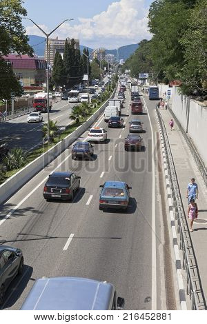 Adler, Krasnodar region, Russia - July 7, 2016: View from the elevated pedestrian crossing on Lenin Street Adler, Sochi