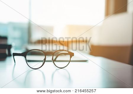 Eye Glasses On The Study Table Education Concept
