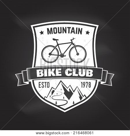 Mountain bike club. Vector illustration. Concept for shirt or logo, print, stamp or tee. Vintage typography design with bike and mountain silhouette. Chalk drawing on a blackboard.