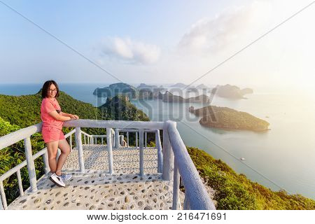Woman Tourist On Peak Viewpoint Of Island