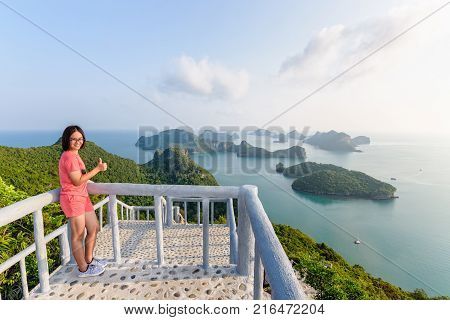 Woman Tourist On Peak Viewpoint Of Island