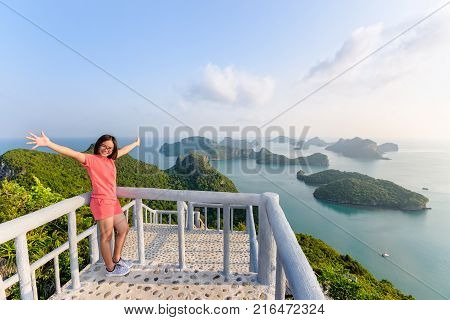 Woman Tourist On Peak Viewpoint Of Island