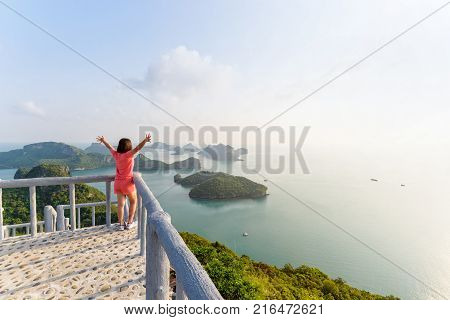 Woman Tourist On Peak Viewpoint Of Island