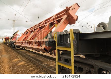 Railway tracklayers ready to lay the rails. Stop before starting work