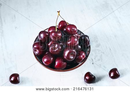 Sour Cherries Dish On White