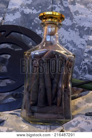 Cartridges Soviet,German,Austrian and Polish  of WWI and WWII in the bottle.Preparing to war relics collection. Found with metal detector 