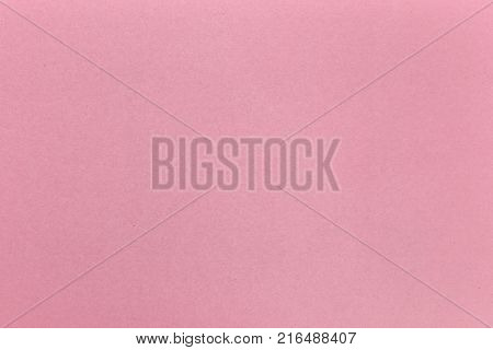Pink design craft paper parchment background texture with dark nap fibers pattern