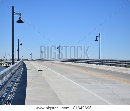 Empty highway highway at day with lightpoles