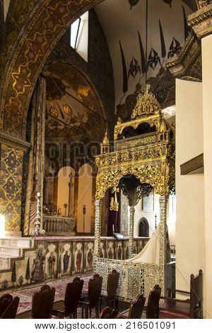 VAGHARSHAPAT ARMENIA - SEPTEMBER 17 2017: Inside one of the oldest Etchmiadzin Cathedrals in the world. It has unique architectural style and design. Catedral and Altar