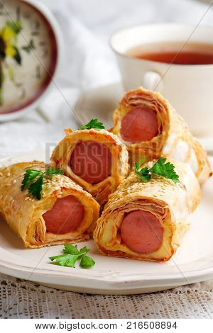 sausages with cheese in lavash for a breackfast. selective focus
