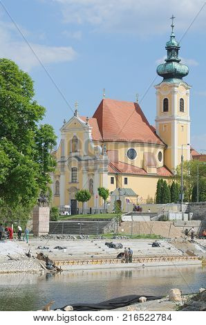 Carmelite Church Next to the Raba River Bank in Gyor City