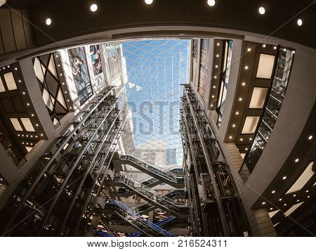 Voronezh, Russia - Circa June 2017: Interior inside the modern shopping center in Voronezh Galereya Chizhova, many floors, elevators, escalators and glass ceiling