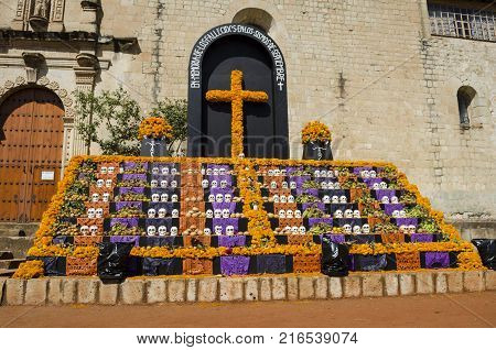 OAXACA, OAXACA, MEXICO- NOVEMBER 1, 2017: Traditional Day of the Dead offering altar in Oaxaca, Mexico for the victims of the earthquakes of September 2017