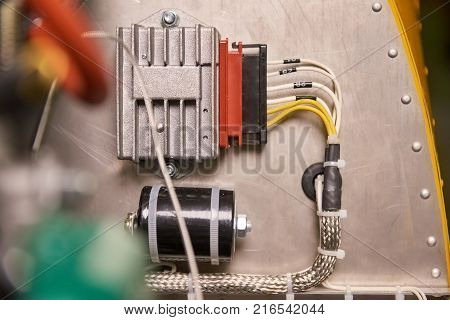 Avionics details. Electronic details affixed to a metal sheet.