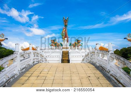 Nakornsawan, Thailand. - October 8, 2017 : Beautiful giant or big colorful dragon statue with blue sky at Nakornsawan Park, Thailand.