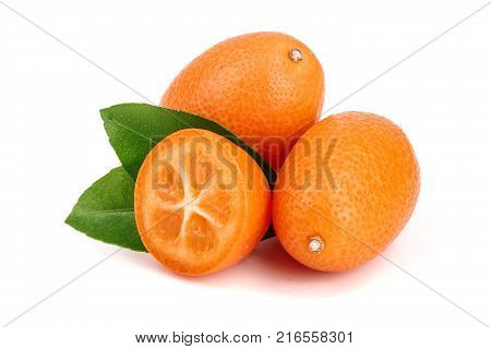 Cumquat or kumquat with leaf isolated on white background close up.