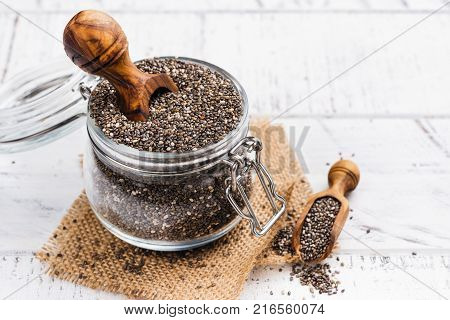 Healthy chia seeds in a glass jar. Healthy eating concept. Copy space