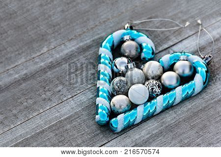 Christmas Ornamnets Collected on Wooden Table for Decorating Christmas Tree Winter Holiday Concept