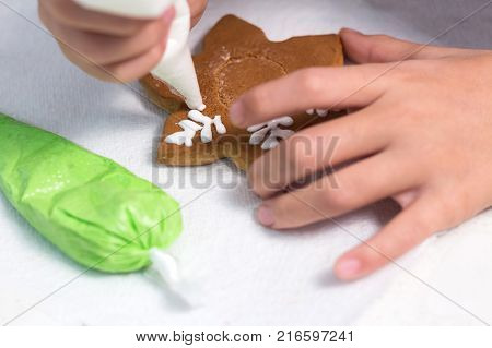 Homemade Christmas Gingerbread Decorated In The Form Of Mittens On The Background Of A White Napkin