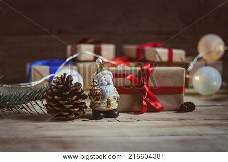 Piece Of Kraft Paper And Three Flowers Of Different Colors