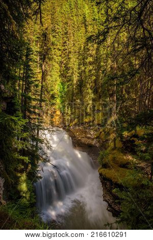 Waterfall in Johnston Canyon, Canada. Johnston Canyon is one of the most popular day hikes in Banff National Park.