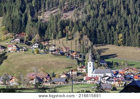 Beautiful mountain landscape. Alpine village Sankt Margarethen in Reichenau. State of Carinthia, Gurktal Alps, Austria