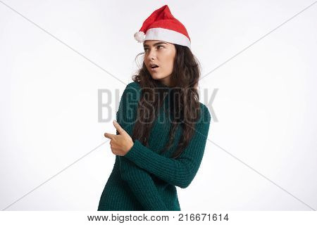 woman posing on a light background, free space for copy, winter.