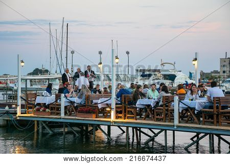 Montenegro, Budva, Restaurant Jadran - May 30/2017: Restaurant Workers Meet Their Customers With Liv