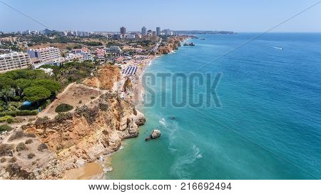 Aerial. Tourist beaches of the Portuguese city of Portimao. Shooted by drones Algarve