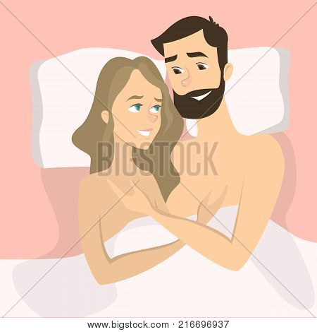 Happy smiling couple in bed lying naked.