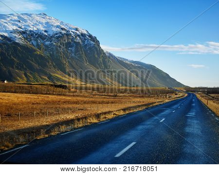 Curve raod to the mountain with motion blur Iceland