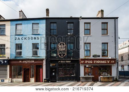 Cork, Ireland - November 12, 2017: Old vintage stores in Cornmarket Street in city center of Cork