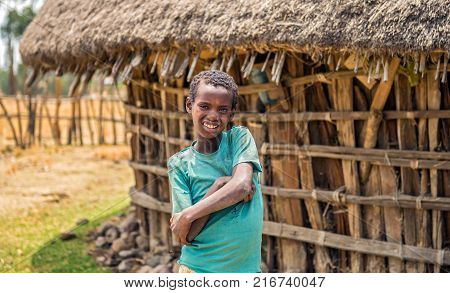 ADDIS ABABA, ETHIOPIA - MAY 1, 2015 : Ethiopian young boy in front of his home.