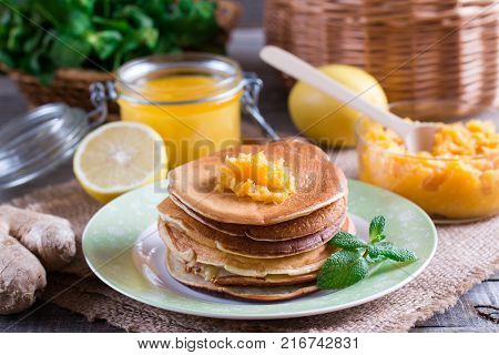 Healthy breakfast. Pancakes with lemon and honey