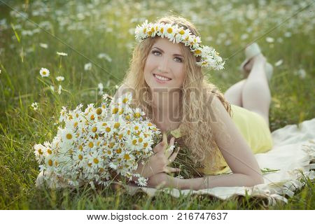 Beautiful Lady With Cute Daughter On Camomile Field Full Of Flowers