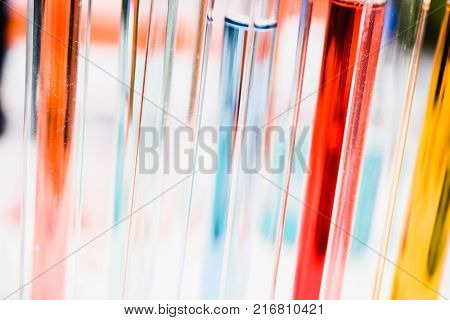 Chemical and Medical laboratory research. Chemical glassware with colorful liquids and reagents.