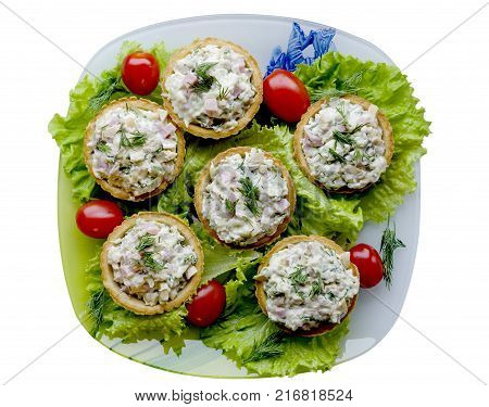 Salad olivie with tomatoes and salad, view from above
