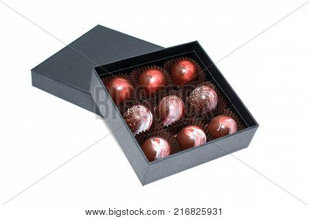 Chocolate candies in giftboxes isolated on white background. Assorted chocolates confectionery in their gift boxes. Set of colorful chocolate bonbons