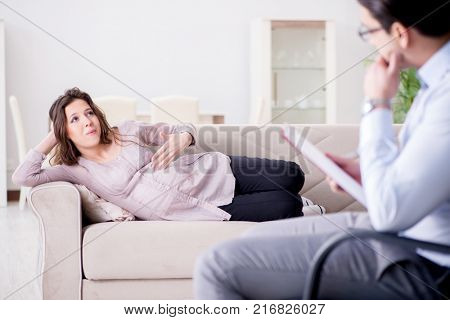 Pregnant woman visiting psychologist doctor