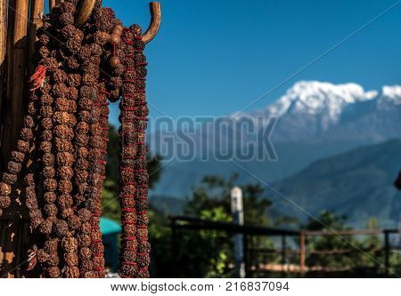 Nepalese prayer rosaries with red thread, Pokhara, Nepal