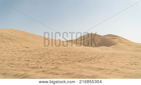 Huacachina Peru - August 2017: Huacachina desert and dunes of sand in Ica region Peru.