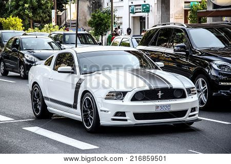 La Condamine Monaco - August 2 2014: White american sportscar Ford Mustang Boss 302 in the city street.