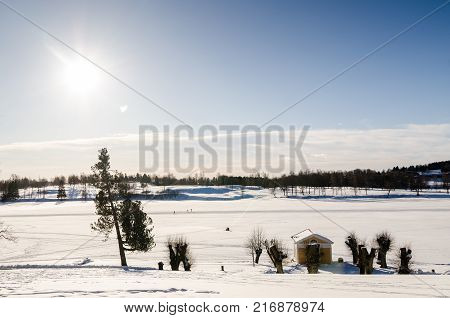 Frozen lake panoramic view of Bogstadvannet lake in Oslo, Norway. Copying space