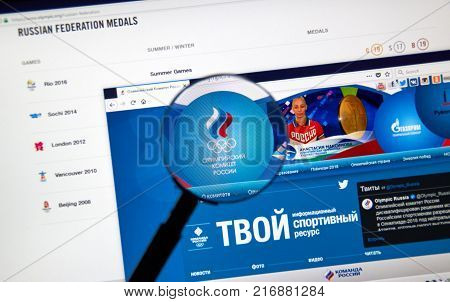 MONTREAL CANADA - DECEMBER 5 2017: Russian Olympic Committee web page under magnifying glass.