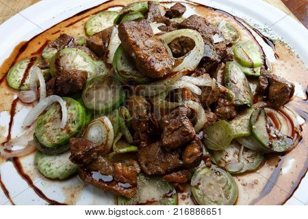 Jilo with beef stewed in the sauce