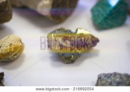 Stone look like apatite among other rocks