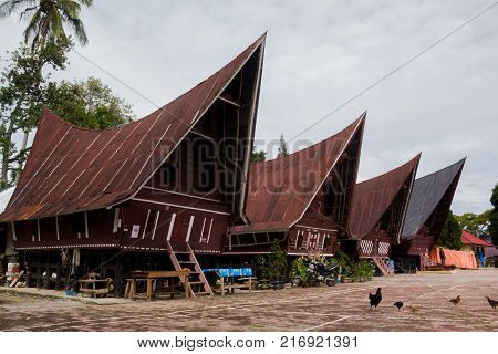 SUMATRA, INDONESIA - 16 SEPTEMBE 2017 : Ethnic traditional Batak House in Toba Lake of Sumatra Indonesia. Batak stands for the ethnic people living in the northern part of Sumatra Island of Indonesia.