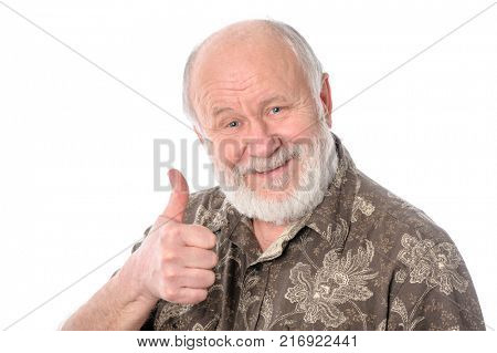 Handsome bald and bearded senior man shows thumbs upgesture, isolated on white background