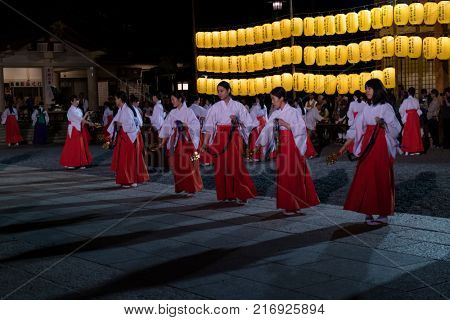 Hiroshima, Japan -  May 27, 2017: Manto Mitama Matsuri festival at the Hiroshima Gokoku-jinja Shrine, the spectacle of 100 shrine maidens dancing by lantern light 