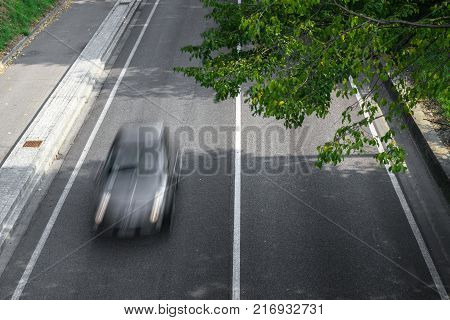 Motion blur of cars in aerial view over the road. (Speed limits - Infractions - Speed Camera)